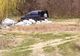 Slatina: Un bărbat care a depozitat deşeuri, într-o pădure de la ieşirea din oraş, identificat de Poliţia Locală după o postare pe Facebook